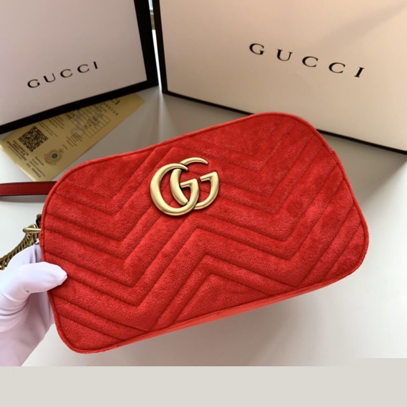 G*u*i clutch bags